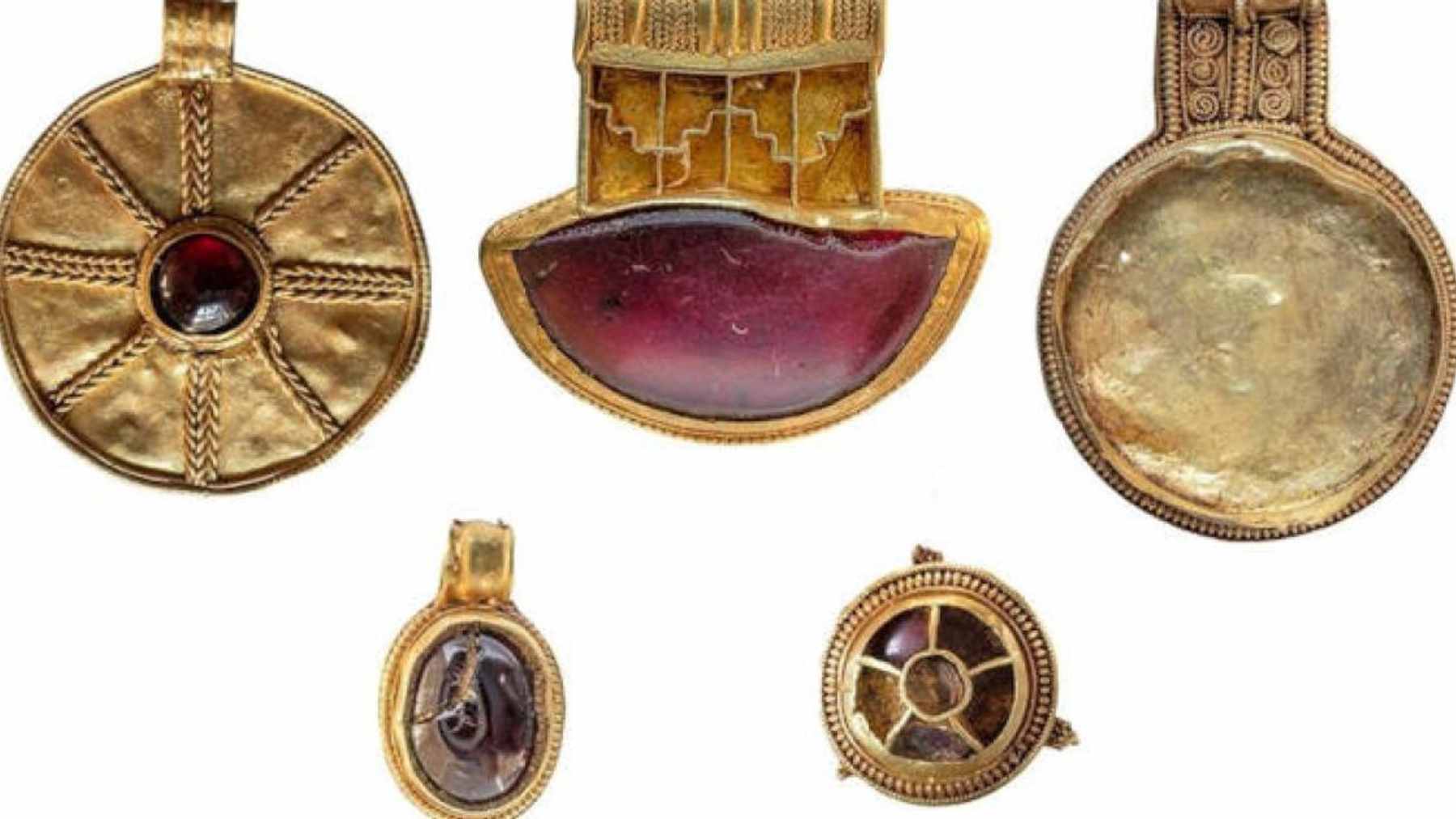 Five pieces of 7th-century Anglo-Saxon gold and garnet jewelry found on a hillside in Donington-on-Bain, Lincolnshire.