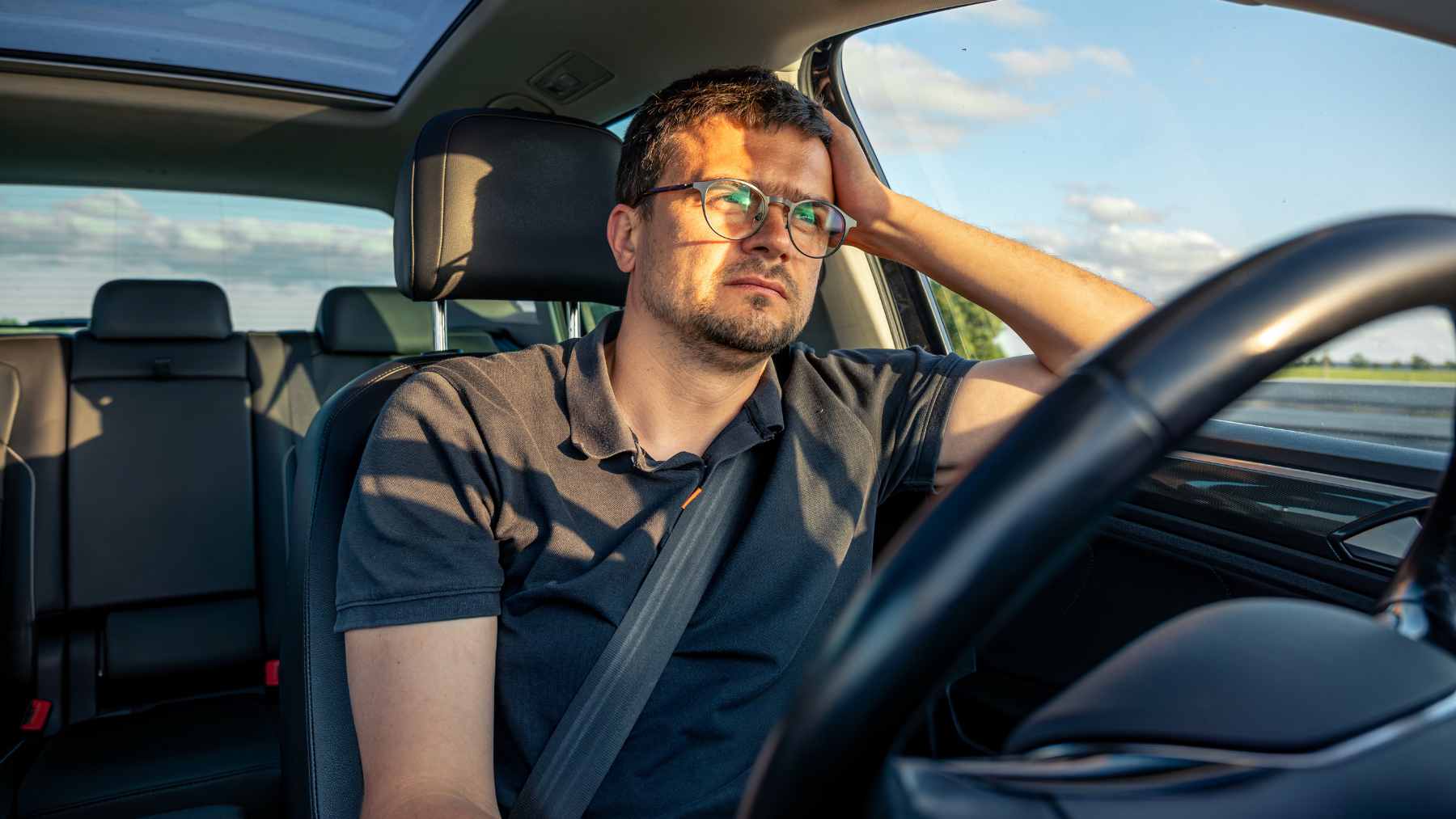 A New York state speed limit sign on a highway, illustrating the strict new enforcement of the Driver Violation Point System.