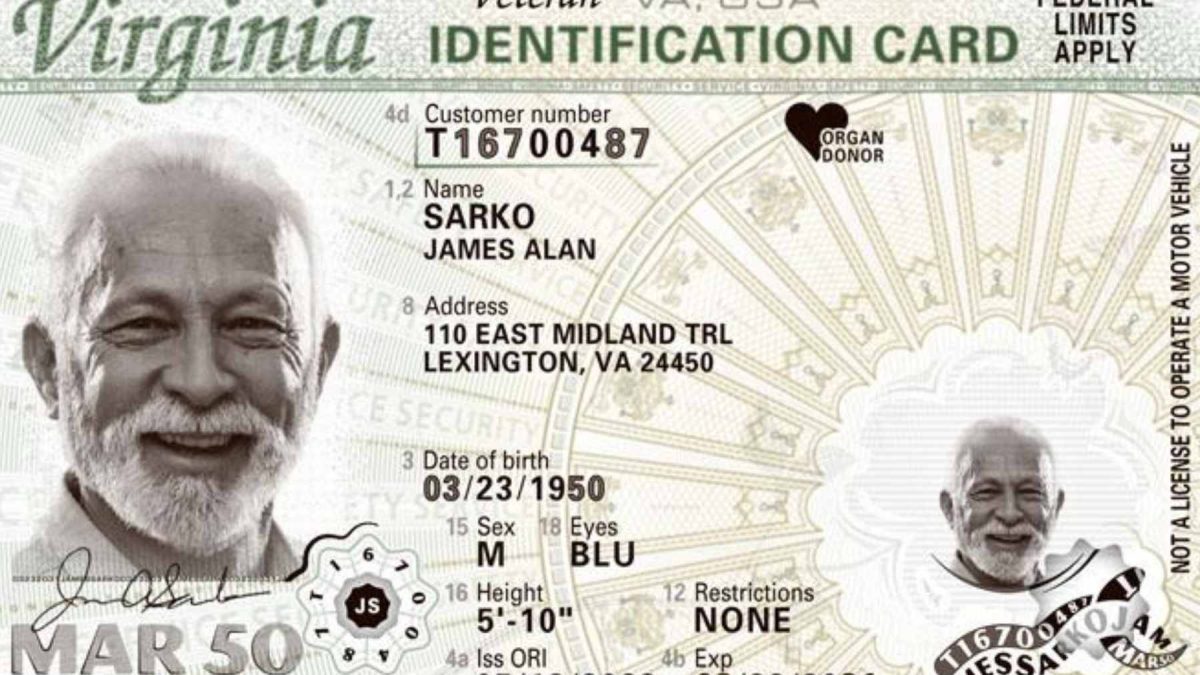 An older driver at a Virginia DMV office undergoing a mandatory vision screening for license renewal.