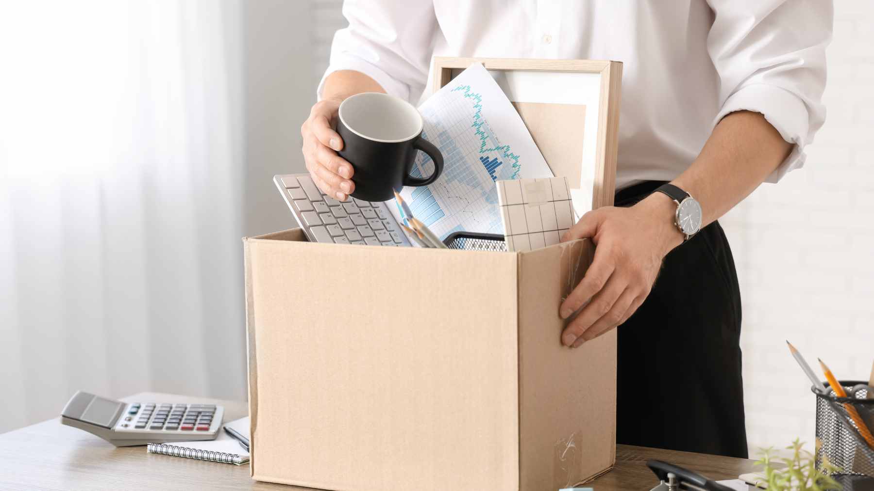 A modern Amazon corporate office building with employees entering, illustrating the "Great Flattening" of white-collar roles.